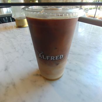 Alfred - 24oz iced vanilla latte with oat milk and 2 extra shots. ~$8 - Coffee & Tea Near Me - Austin, Texas