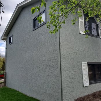 Captain Hooks Painting and lighting - Finished stucco house - Painters Near Me - Mount Perry, Ohio