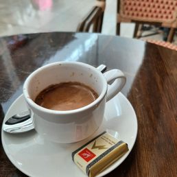 My espresso comes with Swiss dark chocolate My espresso comes with Swiss dark chocolate