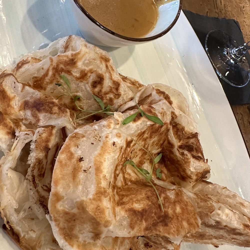 The Nest SSI - Roti with curry sauce - Tapas/Small Plates Near Me - St. Simons Island, Georgia The Nest SSI - Roti with curry sauce - Tapas/Small Plates Near Me - St. Simons Island, Georgia