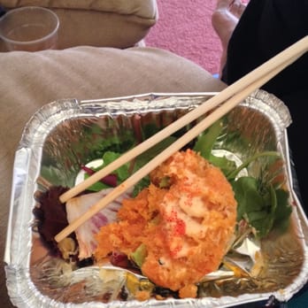 Sanma - Spicy sushi bowl (half eaten).. Salmon, crunchies, avocado, caviar and spicy sauce on top.. Tasty but not really spicy - Sushi Bars Near Me - Staten Island, New York