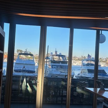 Blue Bottle Coffee - Only in Southern California: fancy boats right outside the coffee bar. - Coffee & Tea Near Me - Newport Beach, California Blue Bottle Coffee - Only in Southern California: fancy boats right outside the coffee bar. - Coffee & Tea Near Me - Newport Beach, California