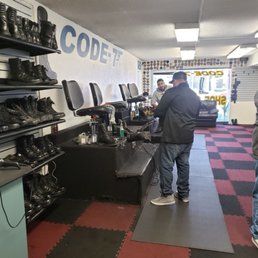 This is the 2 workers and my husband on the right, the only people in the the shop, besides me...
