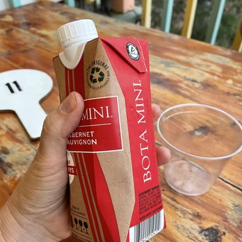 Red's Pizzeria - a hand holding a carton of red's pizzeria - Pizza Near Me - Eureka Springs, Arkansas Red's Pizzeria - a hand holding a carton of red's pizzeria - Pizza Near Me - Eureka Springs, Arkansas