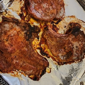 Kara's Kitchen - a pan of meat on a table - Caterers Near Me