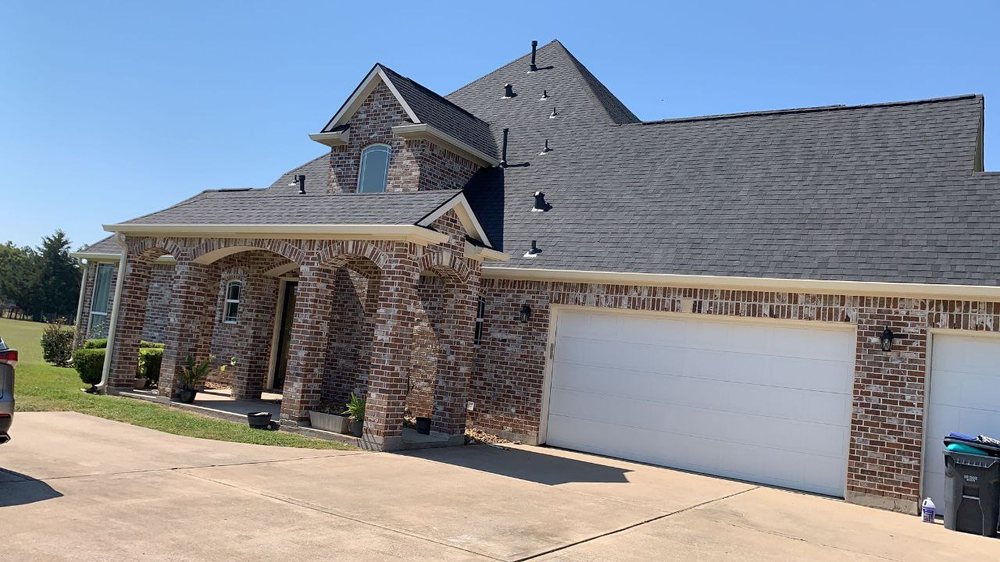 Slide of Reborn Roofing & Construction