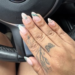 Gel X almond nails with chrome and gold detailing