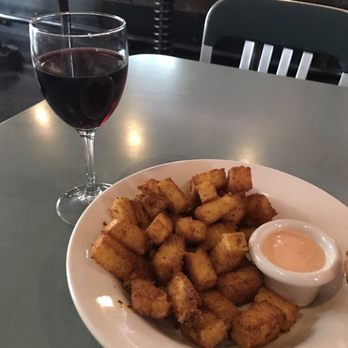 Cyclops Cafe and Lounge - Polenta fries and house red wine. Delicious! - Burgers Near Me - Seattle, Washington