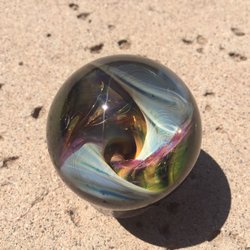 8th Wonder Studio - One of Residen Artist HamstaFam's marbles