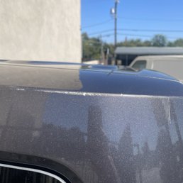 Damage on vehicle due to car wash.