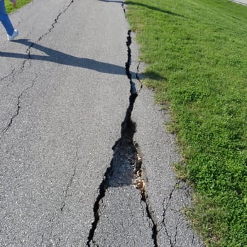 Arthur Storey Park - Drought of 2011 caused permanent cracks in the asphalt trail - Parks Near Me - Houston, Texas
