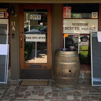 Screen Doctors - Social Distancing during COVID, met outside by Craig while filling-out work request on an old wine barrel - Windows Installation Near Me - Alamo, California Screen Doctors - Social Distancing during COVID, met outside by Craig while filling-out work request on an old wine barrel - Windows Installation Near Me - Alamo, California