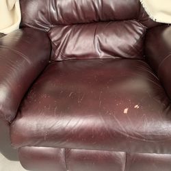 La-Z-Boy Furniture Galleries - The recliner that was delivered to my home in 2019. I always keep the beige throw blanket on it .