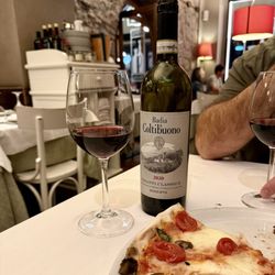 Taverna Rossini - Bottle of wine with pizza