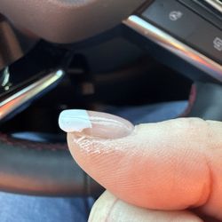 Perfect Nails - The French white tip polish doesn't even make it to the edge and she scuffed up my skin