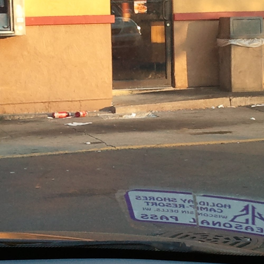 Popeyes Louisiana Kitchen - This is the filthy parking lot!!! Classy - Fast Food Near Me - Milwaukee, Wisconsin