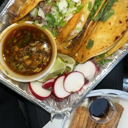 Tacos de birria (3) tacos and CHURROS with side dipping sauce