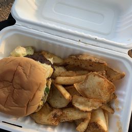 Single burger and potato chip fries Single burger and potato chip fries