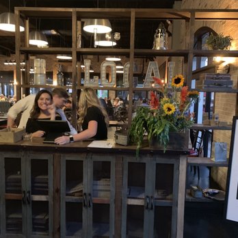 Local Table - Hostess's desk. - Mediterranean Near Me - Katy, Texas