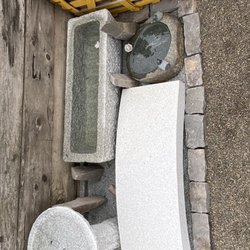 Hand made bird baths and a bridge.