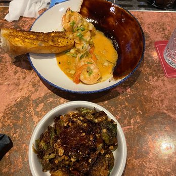 Lucky Shuck - Nawlins-style bbq shrimp on top, crispy Brussels on bottom - Seafood Near Me - Jupiter, Florida Lucky Shuck - Nawlins-style bbq shrimp on top, crispy Brussels on bottom - Seafood Near Me - Jupiter, Florida