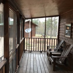 Sleepy Bear Cabins - Each of the 1 BR cabins, Kodiak and Brown, have a screen porch. All cabins have DirecTV.