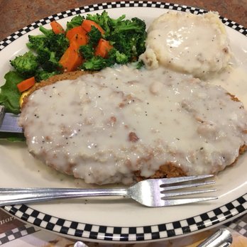 Black Bear Diner Sequim - My dinner fork was placed in the photo to show the size of the chicken fried steak. - American Near Me - Sequim, Washington