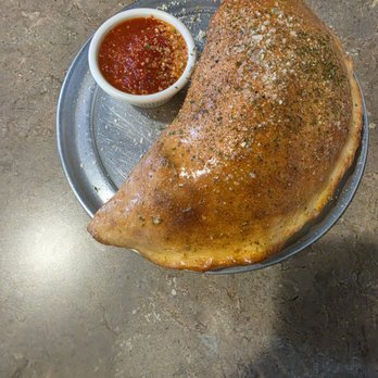 Zuko Pizza Pasta - Calzone- pepperoni, sausage, and hamburger - Italian Near Me - Rowlett, Texas Zuko Pizza Pasta - Calzone- pepperoni, sausage, and hamburger - Italian Near Me - Rowlett, Texas