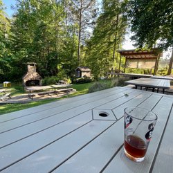 Jocassee Valley Brewing Company - Beautiful outdoor space with stage and fireplace