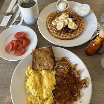 Shorehouse Kitchen - Two eggs with toast, side hash brown, and tomato + Salted caramel waffle - Coffee & Tea Near Me - La Jolla, California Shorehouse Kitchen - Two eggs with toast, side hash brown, and tomato + Salted caramel waffle - Coffee & Tea Near Me - La Jolla, California