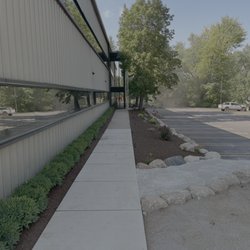 Gresham's Snow Removal & Landscaping - Boulder path landscaping installation in front of business