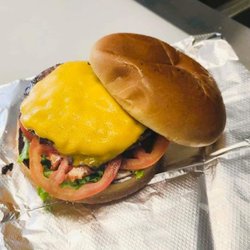 60 & Two - Loadmaster burger with tomatoes and lettuce.