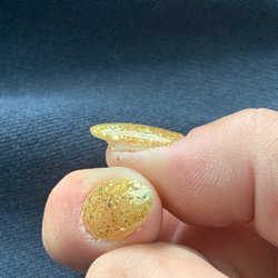 Nail Trix - Almost every nail will need the sides straightened up and clumps of acrylic cleaned from underneath