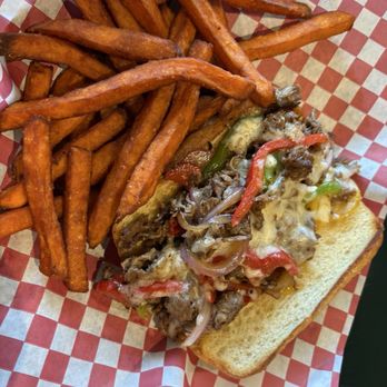 Tualatin Island Greens - Philly cheesesteak W/Sweet Potato Fried - Mini Golf Near Me - Tualatin, Oregon Tualatin Island Greens - Philly cheesesteak W/Sweet Potato Fried - Mini Golf Near Me - Tualatin, Oregon