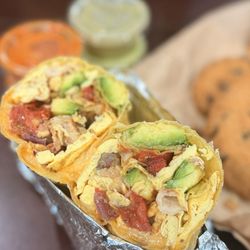 This is the breakfast burrito with bacon. Could use a little more seasoning. The red salsa has a kick and green salsa was also delicious.