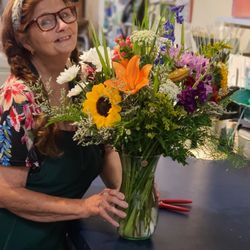 The Colonial Flower Shop - A Summer vase about to be wrapped, and head out to a local delivery.