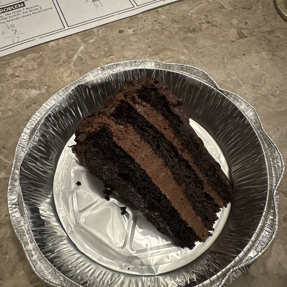 Mio Italian Kitchen - Chocolate mousse cake (I do not recommend. Tastes like grocery store chocolate cake) - Italian Near Me - Edmond, Oklahoma