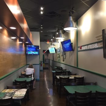 Wingstop - Dining area - Chicken Wings Near Me - Medford, Massachusetts Wingstop - Dining area - Chicken Wings Near Me - Medford, Massachusetts