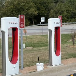 Tesla Supercharger - Buckets and squeegees to clean your windshield!