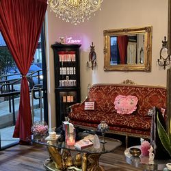 The Wax Goddess - Seating Lobby with amazing books to read meanwhile you wait .