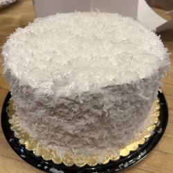 Harlow's DO-Nut & Bakery - Coconut cream cake with strawberry filling