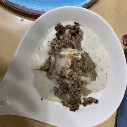 The Rivers Family Restaurant - Biscuit and gravy with extra sausage on top (which I did not ask for but was a nice surprise)