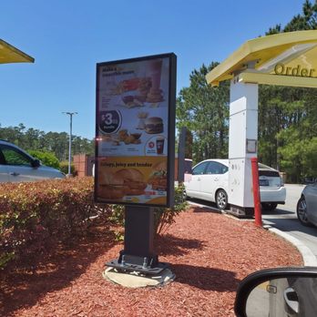 McDonald's - a mcdonald's drive thru sign - Fast Food Near Me - Supply, North Carolina McDonald's - a mcdonald's drive thru sign - Fast Food Near Me - Supply, North Carolina