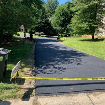 Uneek Paving & Masonry - a paved driveway with yellow tape - Masonry/Concrete Near Me - Piscataway, New Jersey Uneek Paving & Masonry - a paved driveway with yellow tape - Masonry/Concrete Near Me - Piscataway, New Jersey