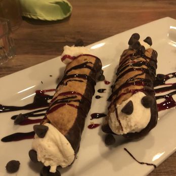 Proof - The canoli is made with their own cream filling per our waitress. Drizzled with chocolate and raspberry. - Italian Near Me - Elizabeth City, North Carolina