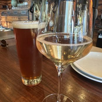 Fireside - Cremant d'Alsace Rose Brut, Fleischer, France NV in the front with a red ale - New American Near Me - Portland, Oregon