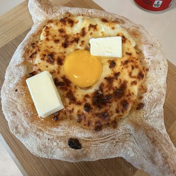 Bread Boat - Adjaruli Khachapuri (Classic) Adjaruli Khachapuri (Classic) - Breakfast & Brunch Near Me - Austin, Texas