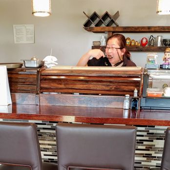 Nittha Siam Kitchen - Employee eating behind the sushi bar - Sushi Bars Near Me - Highland Heights, Kentucky Nittha Siam Kitchen - Employee eating behind the sushi bar - Sushi Bars Near Me - Highland Heights, Kentucky