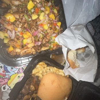 Rose's Cuisine - Loaded stew chicken fries and Beef Patty oxtail sandwhich - Caribbean Near Me - Port Charlotte, Florida