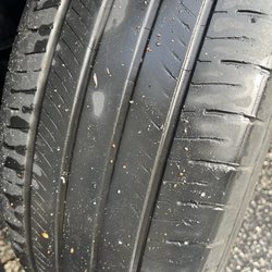 Avis - Bald tires on a junk car Avis rents.